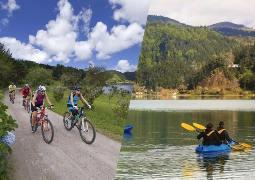 Group of cyclists riding on a dirt path alongside a lake with kayakers in the water.