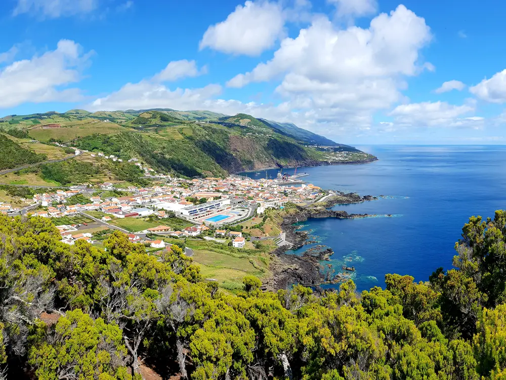 Panoramic view of Sao Jorge Island featuring coastal landscape and village.